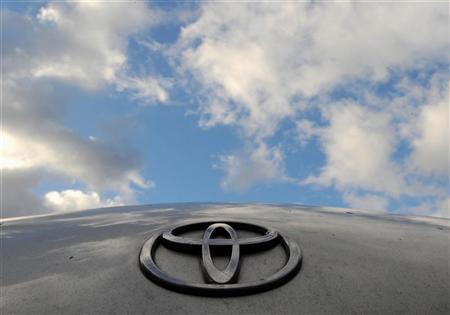 A Toyota Logo is pictured on a Prius car at a Toyota dealership in west London February 9, 2010. REUTERS/Toby Melville