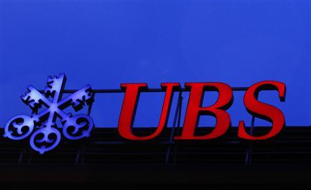 A logo of Swiss bank UBS is seen on a building in Zurich December 18, 2012. REUTERS/Michael Buholzer