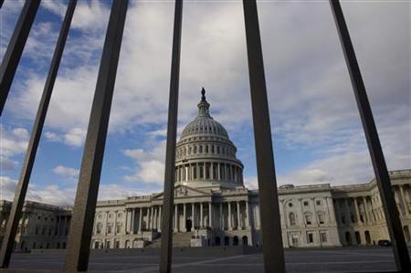 The U.S. Capitol building is pictured behind a fence as lawmakers return from the Christmas recess in Washington The U.S. Capitol building is pictured behind a fence as lawmakers return from the Christmas recess in Washington December 27, 2012. REUTERS/Mary F. Calvert