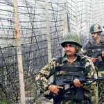 Border Security Force soldiers patrol along the India-Pakistan border in Suchitgarh near Jammu.