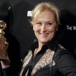 Actress Meryl Streep shows off her Golden Globe award for the best performance by an actress in a motion picture - drama for her work in " The Iron Lady" during her arrival at the The Weinstein Company after party following the 69th annual Golden Globe Awards in Beverly Hills, California January 15, 2012. Meryl Streep has won the most Golden Globes (eight), followed by Jack Nicholson (six) and Francis Ford Coppola, Shirley MacLaine, Rosalind Russell and Oliver Stone (five apiece). REUTERS/Gus Ruelas