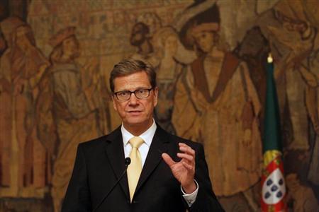 Germany's Foreign Minister Guido Westerwelle gestures during a news conference at Palacio das Necessidades in Lisbon January 24, 2013. REUTERS/Hugo Correia