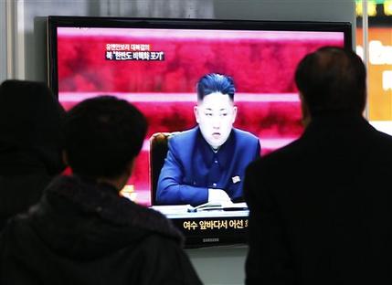 People watch TV showing North Korean leader Kim Jong Un at Seoul Railway Station in Seoul, South Korea, Wednesday, Jan. 23, 2013.  North Korea swiftly lashed out against the U.N. Security Council's condemnation of its December launch of a long-range rocket, saying Wednesday that it will strengthen its military defenses - including its nuclear weaponry - in response.(AP Photo/Ahn Young-joon)