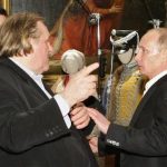 French actor Gerard Depardieu (L) speaks with Vladimir Putin (R), then Russian Prime Minister, during a meeting in St.Petersburg in this December 11, 2010 file photo. REUTERS/Alexei Nikolsky/RIA Novosti/Pool/Files