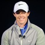 Rory McIlroy of Northern Ireland smiles during a presentation unveiling him as Nike's new ambassador in Abu Dhabi January 14, 2013. World golf number one McIlroy wants Ireland's Paul McGinley to be Europe's 2014 Ryder Cup skipper, rather than Colin Montgomerie, with a decision on the captaincy due on Tuesday. REUTERS/Ben Job