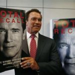 Actor and former California governor Arnold Schwarzenegger presents his book 'Total Recall' during a news conference during the book fair in Frankfurt, in this October 10, 2012 file photo. A year after leaving the California governor's office and becoming tabloid fodder for fathering a boy with his family's housekeeper and splitting with his wife, Maria Shriver, the 65-year old former bodybuilder will star in no less than three Hollywood movies over the next 12 monthsREUTERS/Ralph Orlowski/Files