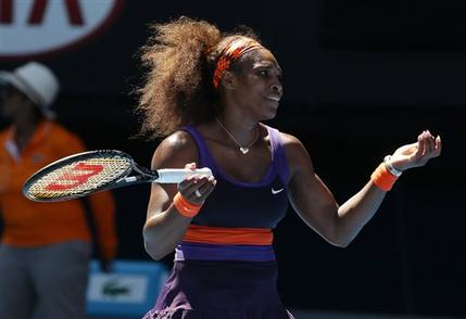 Serena Williams of the US reacts during her quarterfinal match against compatriot Sloane Stephens at the Australian Open tennis championship in Melbourne, Australia, Wednesday, Jan. 23, 2013. (AP Photo/Aaron Favila)