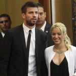 Colombian pop star and the United Nations Children's Fund (UNICEF) ambassador, Shakira, walks with her boyfriend, Barcelona soccer player Gerard Pique, after her joint news conference with Israel's president Shimon Peres (not seen) at the 3rd annual Israeli Presidential Conference in Jerusalem June 21, 2011. REUTERS/Ronen Zvulun