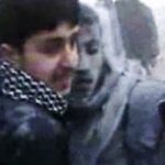 In this image taken from video obtained from Bambuser, which has been authenticated based on its contents and other AP reporting, Syrians help an inured man after an airstrike hit Douma City, Syria on Thursday, Jan. 3, 2013. Airstrikes continued across Syria on Thursday as Syrian President Bashar Assad's military stepped up its assault on areas that surround the nation's capital. (AP Photo/Bambuser via AP video)