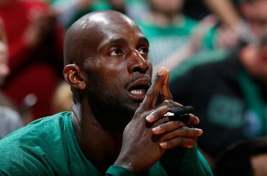 ATLANTA, GA - JANUARY 25:  Kevin Garnett #5 of the Boston Celtics reacts on the bench in the final seconds of their 123-111 loss to the Atlanta Hawks in the second overtime at Philips Arena on January 25, 2013 in Atlanta, Georgia.  NOTE TO USER: User expressly acknowledges and agrees that, by downloading and or using this photograph, User is consenting to the terms and conditions of the Getty Images License Agreement.  (Photo by Kevin C. Cox/Getty Images)