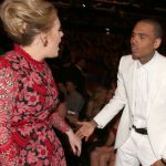 Adele reveals exactly what she said to Chris Brown in THAT photo at the Grammys