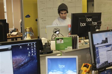 An employee works at the headquarters of Box.net, an online file sharing and Cloud content management service for enterprise companies, in Menlo Park, California February 5, 2013. REUTERS/Robert Galbraith