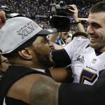 Baltimore Ravens linebacker Ray Lewis, left, and quarterback Joe Flacco celebrate their 34-31 win against the San Francisco 49ers in the NFL Super Bowl XLVII football game, Sunday, Feb. 3, 2013, in New Orleans. (AP Photo/Julio Cortez)