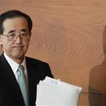 Bank of Japan Governor Masaaki Shirakawa leaves a news conference in Tokyo February 14, 2013. REUTERS/Yuya Shino