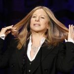 Singer and actress Barbra Streisand reacts as she speaks on stage at the Public Counsel's 40th anniversary event in Beverly Hills, California March 18, 2011. REUTERS/Mario Anzuoni
