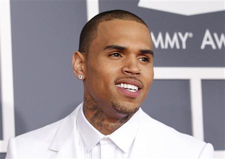 Singer Chris Brown arrives at the 55th annual Grammy Awards in Los Angeles, California February 10, 2013. REUTERS/Mario Anzuoni
