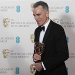 Daniel Day-Lewis celebrates after winning the Best Actor award for "Lincoln" at the British Academy of Film and Arts (BAFTA) awards ceremony at the Royal Opera House in London February 10, 2013. REUTERS/Suzanne Plunkett
