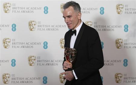 Daniel Day-Lewis celebrates after winning the Best Actor award for "Lincoln" at the British Academy of Film and Arts (BAFTA) awards ceremony at the Royal Opera House in London February 10, 2013. REUTERS/Suzanne Plunkett