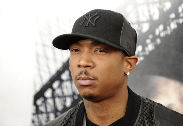 FILE - In this March 2, 2010 file photo, rapper Ja Rule attends the premiere of "Brooklyn's Finest" in New York. Platinum-selling rapper Ja Rule was set to leave an upstate New York prison on Thursday, Feb. 21, 2013 after serving most of his two-year sentence for illegal gun possession but head straight into federal custody in a tax case. (AP Photo/Peter Kramer, File) ** Usable by LA and DC Only **