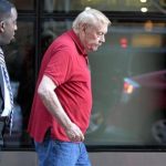 File photo of Los Angeles Lakers owner Jerry Buss leaving after NBA labor meetings in New York October 4, 2011. REUTERS/Brendan McDermid