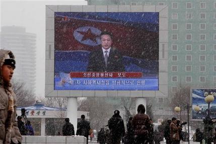 On a large television screen in front of Pyongyang's railway station, a North Korean state television broadcaster announces the news that North Korea conducted a nuclear test on Tuesday, Feb. 12, 2013. North Korea conducted a nuclear test at an underground site in the remote northeast Tuesday, taking an important step toward its goal of building a bomb small enough to be fitted on a missile that could reach United States. The TV screen text reads: "Korean Central News Agency reports," and "The third underground nuclear test successfully conducted."(AP Photo/Kim Kwang Hyon)