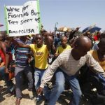 File photo of striking platinum miners march near the Anglo-American Platinum (AMPLATS) mine near Rustenburg in South Africa's North West Province, October 5, 2012. REUTERS/Mike Hutchings