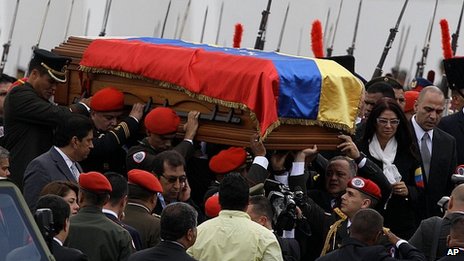 Venezuela’s late president Chavez makes final journey