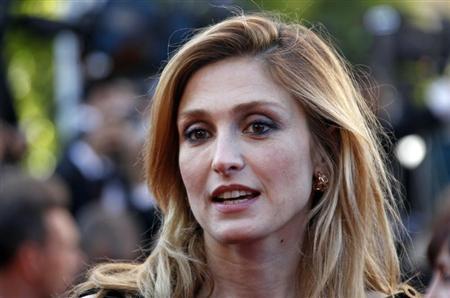 French actress Julie Gayet arrives on the red carpet for the screening of the film "Moonrise Kingdom", by director Wes Anderson, in competition at the 65th Cannes Film Festival May 16, 2012. REUTERS/Jean-Paul Pelissier