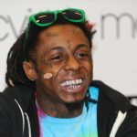 Lil Wayne is 'alive and well,' did suffer seizure, colleagues say