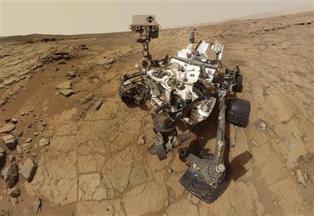 NASA's Mars rover Curiosity is pictured in this February 3, 2013 handout self-portrait obtained by Reuters February 9, 2013. REUTERS/NASA/Handout
