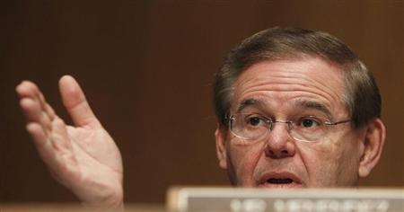Senator Robert Menendez (D-NJ), a member of the Senate Banking, Housing and Urban Affairs Committee, asks questions during testimony in Washington February 14, 2013. REUTERS/Gary Cameron