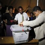 An election official seals a ballot box after the close of voting on a referendum in Mbare, Harare, March 16, 2013. REUTERS/Philimon Bulawayo