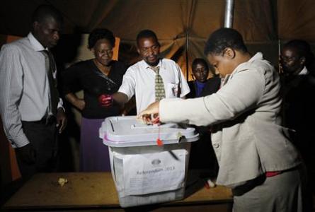 An election official seals a ballot box after the close of voting on a referendum in Mbare, Harare, March 16, 2013. REUTERS/Philimon Bulawayo