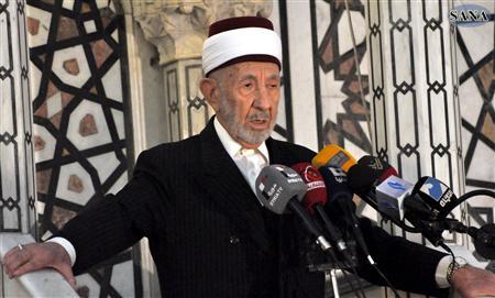 A file photo shows high-level cleric Mohammed al-Buti speaking at a mosque, in this handout photograph distributed by Syria's national news agency SANA on March 21, 2013. REUTERS/SANA/Handout