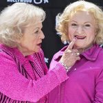 Actress Betty White touches the lips of her wax figure during the unveiling at Madame Tussauds Hollywood wax museum in Los Angeles, California June 4, 2012. REUTERS/Bret Hartman