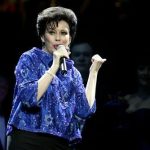 Australian actress Chrissy Amphlett performs as Judy Garland during a photo call for the musical "The Boy from Oz" in Sydney August 2, 2006. REUTERS/Will Burgess