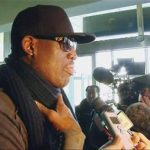 Former U.S. NBA basketball player Dennis Rodman speaks to the media at the airport before departing Pyongyang, March 1, 2013 in this still image taken from video. Rodman watched a basketball match with North Korean leader Kim Jong-un and his wife Ri Sol-ju in Pyongyang on Thursday, North Korea state media reported. REUTERS/KCNA for Reuters TV