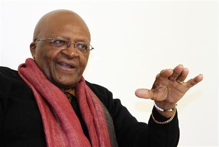 South African Archbishop and Nobel Laureate Desmond Tutu speaks during an interview with Reuters in New Delhi in this February 8, 2012 file photo. REUTERS/B Mathur/Files