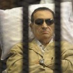 Former Egyptian President Hosni Mubarak sits inside a cage in a courtroom in Cairo June 2, 2012. REUTERS/Stringer