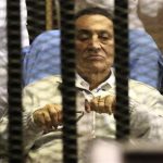 Egypt's ousted President Hosni Mubarak sits inside a dock at the police academy on the outskirts of Cairo April 15, 2013. REUTERS/Stringer