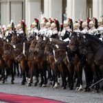 Italy's newly re-elected president Giorgio Napolitano inspects a guard of honor during a welcoming ceremony at the Quirinale palace in Rome, April 22, 2013. REUTERS/Max Rossi