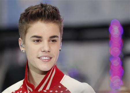 Singer Justin Bieber performs on NBC's "Today" show in New York in this November 23, 2011, file photo. Teen pop star Justin Bieber is taking heat on social media after the Anne Frank House reported he visited the Amsterdam museum and wrote in the guest book he hoped the young Holocaust victim would have been a "belieber," the popular term for his fans, April 14, 2013. REUTERS/Brendan McDermid/Files