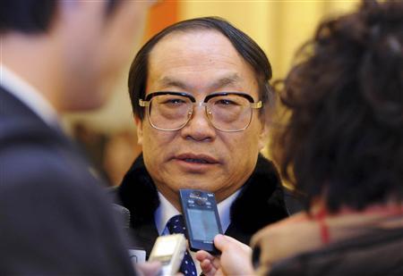 Former railways minister Liu Zhijun talks to the media during the Chinese People's Political Consultative Conference (CPPCC) in Beijing, in this picture taken March 3, 2013. REUTERS/Stringer