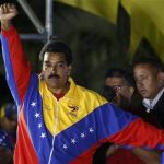 Venezuelan presidential candidate Nicolas Maduro celebrates after the official results gave him a victory in the balloting, in Caracas April 14, 2013. REUTERS/Tomas Bravo