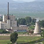 A North Korean nuclear plant is seen before demolishing a cooling tower (R) in Yongbyon, in this photo taken June 27, 2008 and released by Kyodo. REUTERS/Kyodo