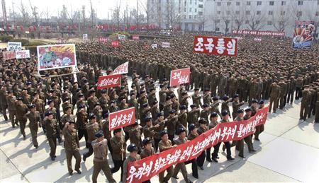North Koreans attend a rally held to gather their willingness for a victory in a possible war against the United States and South Korea in Nampo, North Korea, April 3, 2013 in this picture released by the North's official KCNA news agency in Pyongyang on Wednesday. REUTERS/KCNA