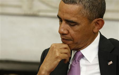 U.S. President Barack Obama listens to Qatar Emir Sheikh Hamad bin Khalifa al-Thaniat (not pictured) at the Oval Office of the White House in Washington, April 23, 2013. REUTERS/Larry Downing