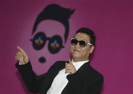 South Korean rapper Psy poses during a news conference before his concert in Seoul April 13, 2013. REUTERS/Lee Jae-Won