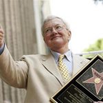 Movie critic Roger Ebert gives the thumbs-up after receiving a star on the Hollywood Walk of Fame in Hollywood June 23, 2005. Ebert passed away Thursday, according to the Chicago Sun-Times. REUTERS/Mario Anzuoni