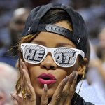 Rihanna and Rihanna's sunglasses excited about Heat win